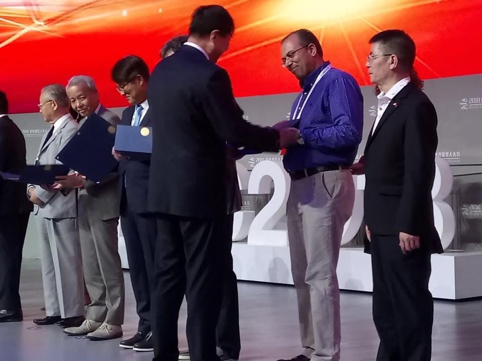 تكريمٌ على منصّة WRC 2018 — بكين